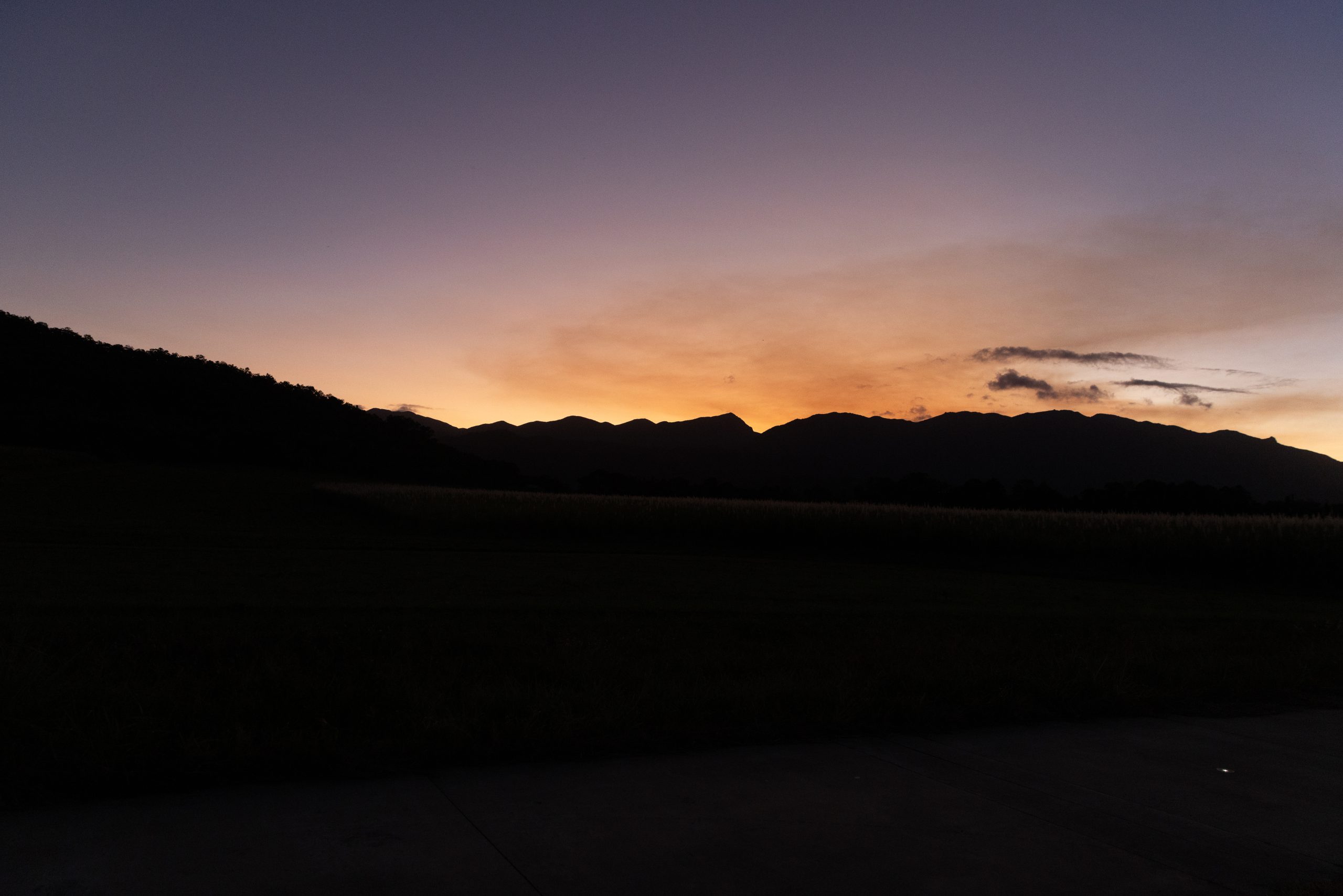 Sunset over ranges and open grassland